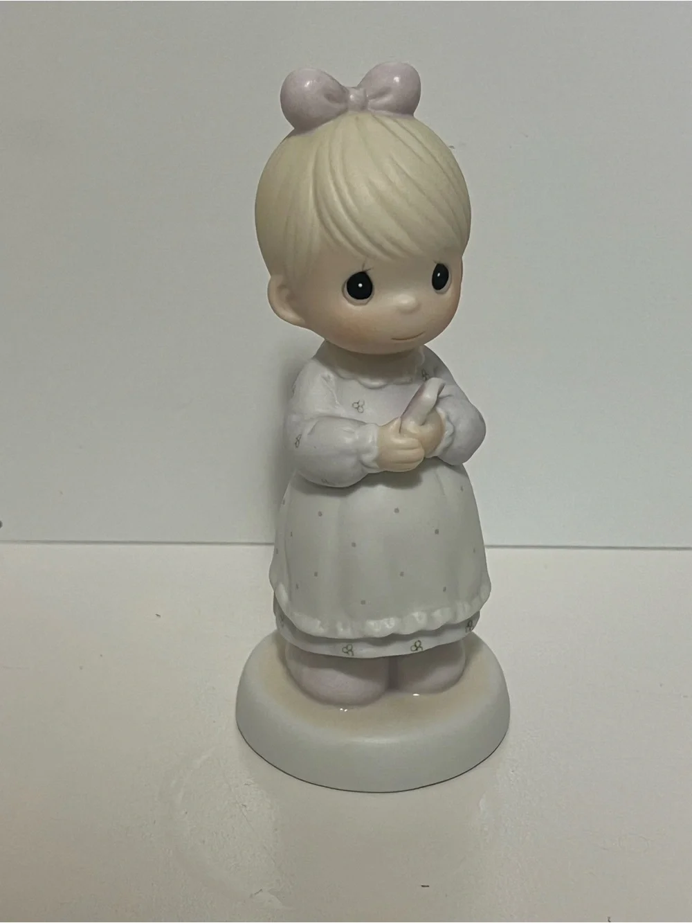 Precious Moments figurine “The Good Lord Always Delivers” from 1989